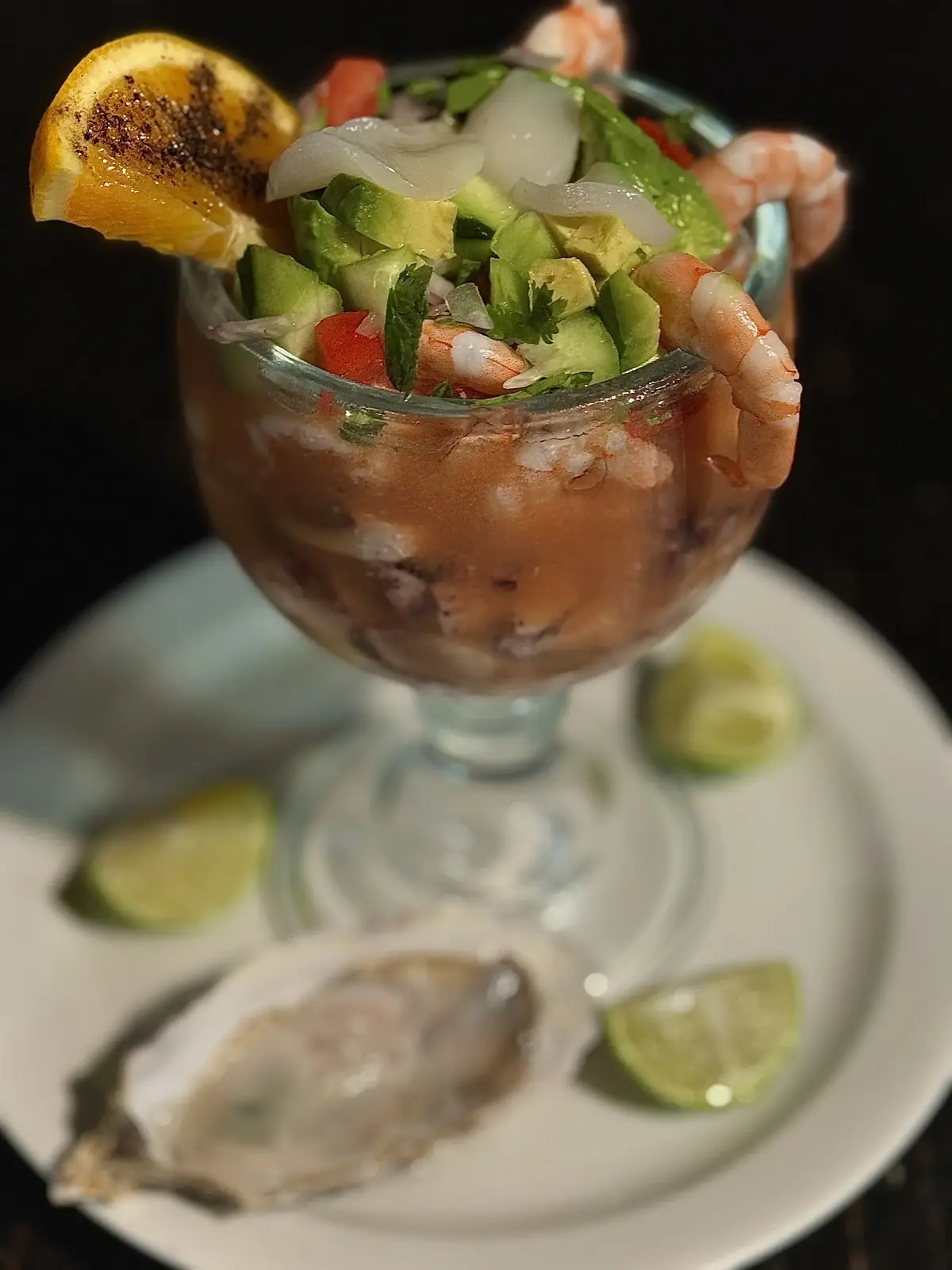 Campechana famous Mariscos Dish in Mexican Cuisine Sereved in Oceanside, CA. It consist of shrimp, octopus, scalops, and an oyster.